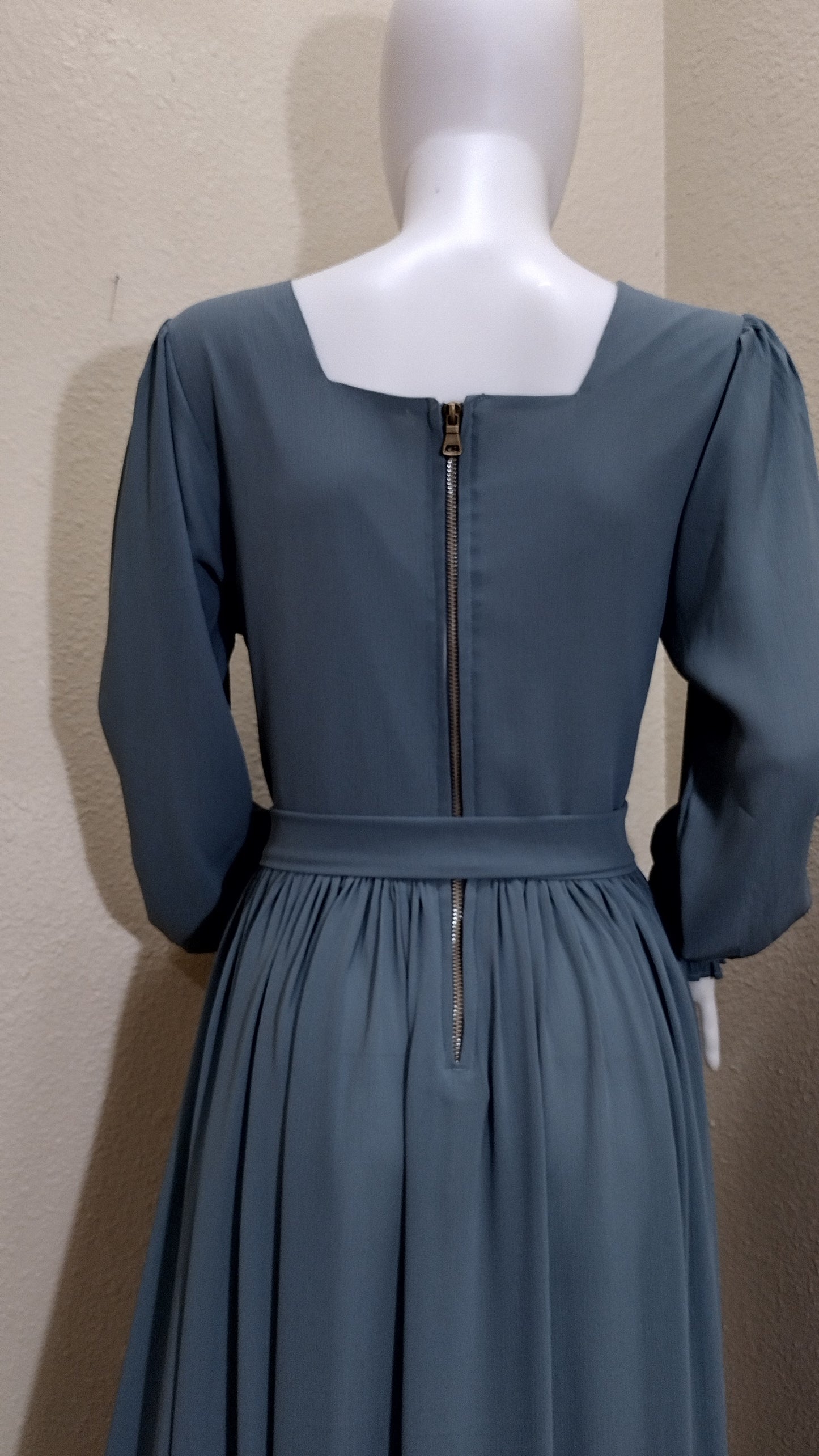 Bodice dress square neckline with ruffle detail.