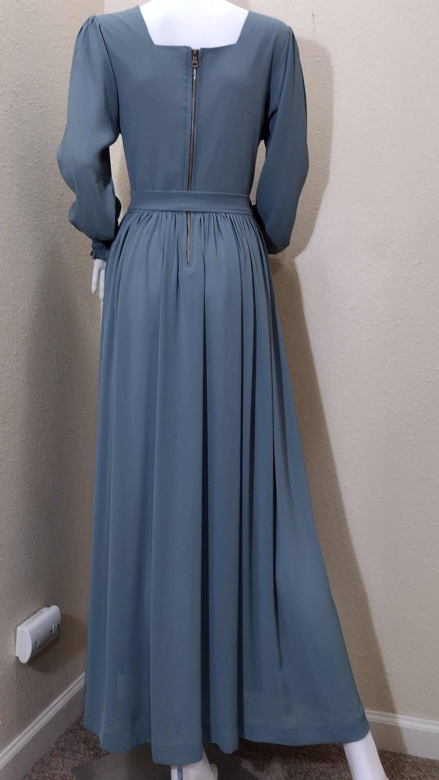 Bodice dress square neckline with ruffle detail.