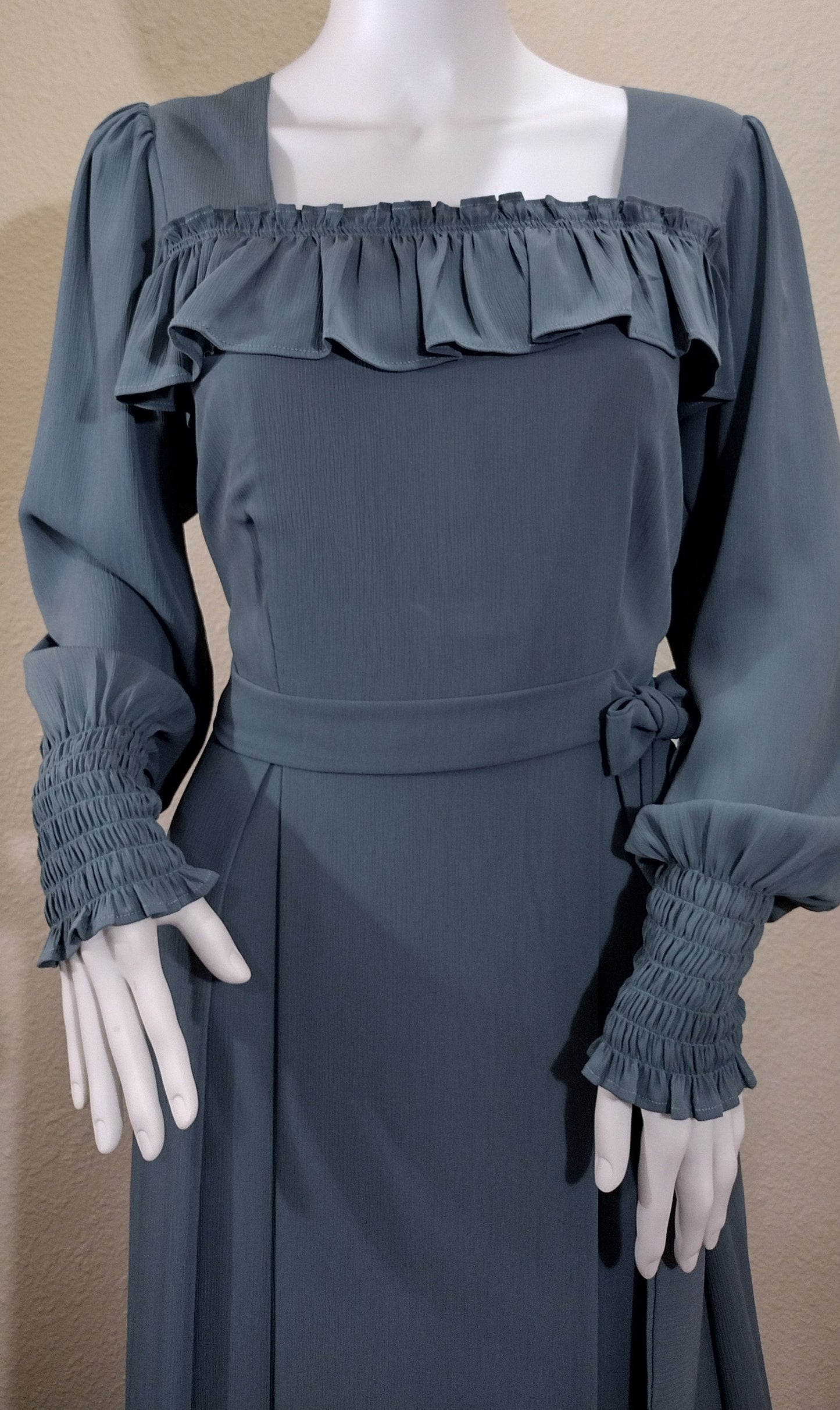 Bodice dress square neckline with ruffle detail.